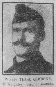 A poor quality newspaper image of a soldier's head and shoulders. He has a large moustache and is wearing a forage cap.