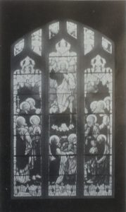 A poor quality printed image of the Lund Park chapel's stained glass window. It is in black and white print from the original order of service.