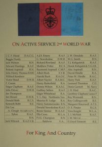 A framed and glazed printed roll of honour with three columns of the men of the church who were on active service in the Second World War.