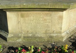 Bingley War Memorial. A sandstone war memorial panel with 56 names inscribed. Included is the name: R. Duxbury.