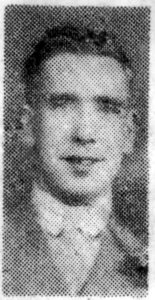 A poor quality photograph from a 1941 newspaper. It is of a man's head and shoulders and he is facing the camera.