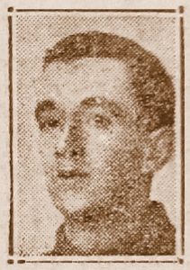 A newspaper photo from 1916 of a man wearing army uniform. Head and shoulders only. He is clean shaven with short hair and is not wearing a cap.