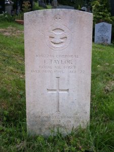 A white headstone from the Commonwealth War Graves Commission surrounded by cut grass. This is for Corporal Jack Taylor who died on 18th January 1945 and is buried at Haworth Cemetery.