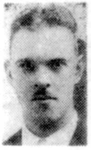 A poor quality newspaper photograph from 1944, of a soldier's head and shoulders. He is facing the camera.