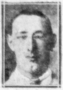 An old newspaper photo of a man's head and neck, he is clean shaven and facing the camera.