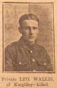 A poor quality photograph from a 1918 newspaper. It is of a man's head and shoulders and he is facing the camera.