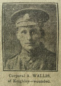 A poor quality newspaper photograph from 1916, of a soldier's head and shoulders. He is wearing a peaked cap with a West Riding Regiment badge and is facing the camera.
