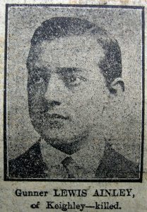 A rather poor quality photograph from a 1917 newspaper. It is of a man's head and shoulders and he is looking to the left.