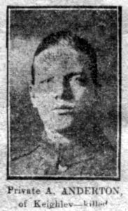 A rather poor quality photograph from a 1916 newspaper. It is of a man's head and shoulders and he is facing the camera.