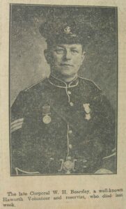 A fairly good quality newspaper photograph of a man wearing British Army uniform and wearing two medals. He is wearing the badge of the West Riding Regiment and is facing the camera.