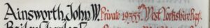 An entry in a roll of honour book. The name Ainsworth, John W.. is in black ink and the details: Private 19355 9th West Yorkshire Regiment, are in red ink.