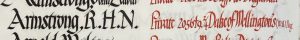 An entry in a roll of honour book. The name Armstrong, John Edwin. is in black ink and the details: Private, 205649, 2/4th Duke of Wellington's (W.R.) Regiment, are in red ink.