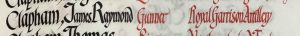 An entry in a roll of honour book. The name Clapham, James Raymond. is in black ink and the details: Gunner, Royal Garrison Artillery, are in red ink.